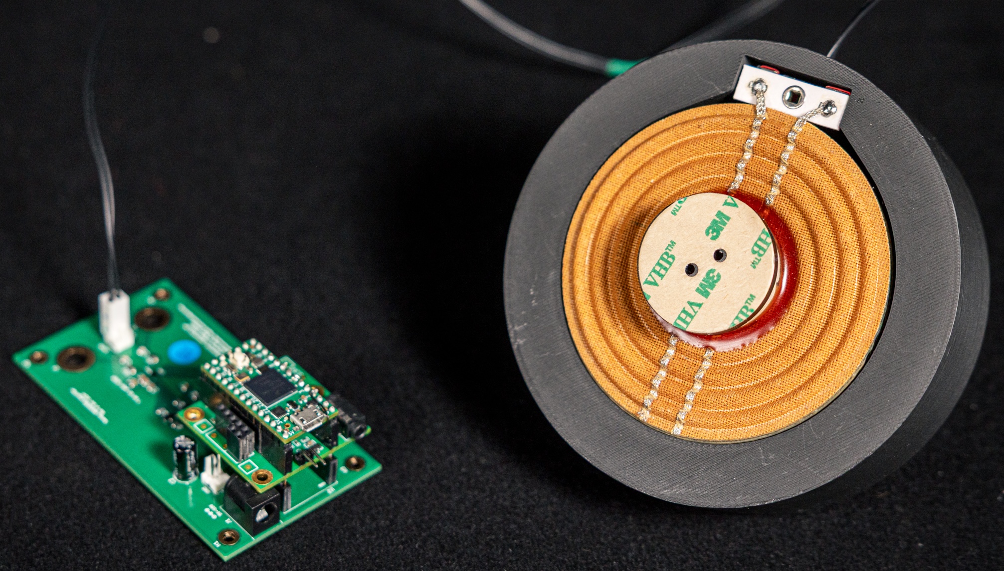 The HaptiCoupler system with amplifier PCB (including the Teensy 4.0) and voice coil